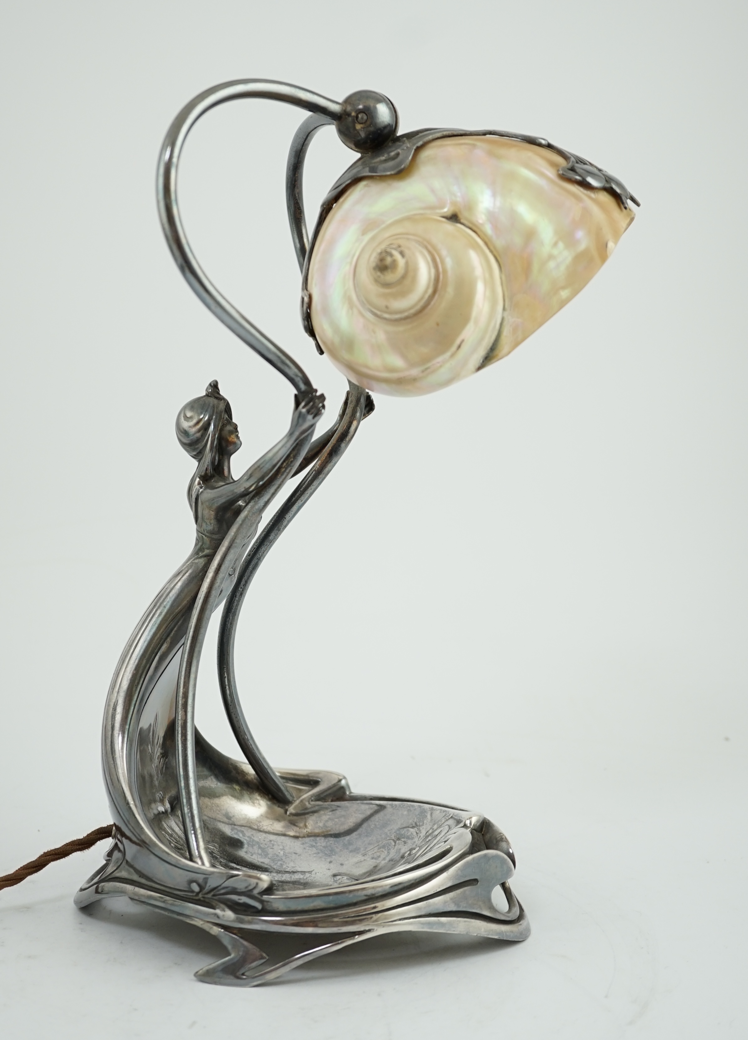 An Art Nouveau electroplate shell mounted adjustable table or wall lamp, by Moritz Hacker, c.1900